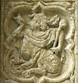 Panel 01:01 - Centaur with unusual head-dress, blowing a horn
